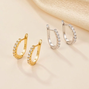 U-shaped 925 sterling silver hoop earrings with pave-set zircon stones in gold and silver