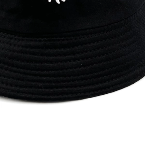 Double-sided daisy embroidered cotton bucket hat for sun protection in classic black