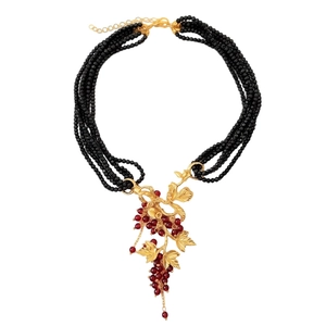Multi-strand glass bead necklace with vintage gold leaf vine and red grape pendant charms
