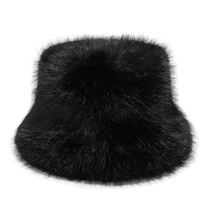 Close-up of plush black faux fur bucket hat showing soft texture and premium material