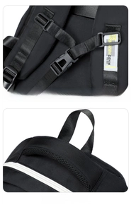 Detail of adjustable chest buckle and thickened ergonomic handle on black backpack