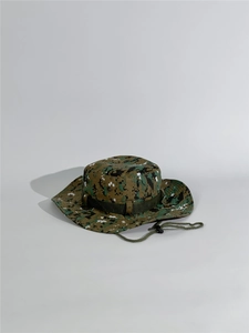 Detail view of digital camouflage boonie hat with adjustable wind cord and side vent