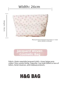 Détail de la trousse fleurie montrant les dimensions 26x18cm et le tissu jacquard