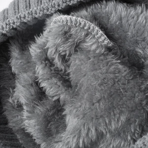 Outdoor knit hat with thick gray faux fur lining and warm thermal fleece interior