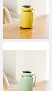 Detail view of mini mushroom stainless steel thermos with carry strap in lime and yellow