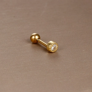 Detailed view of a gold-plated stainless steel barbell earring with a zircon stone setting