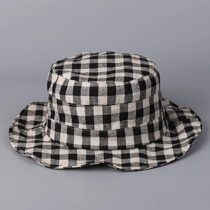 Vintage flat top linen bucket hat with classic black and cream checkered gingham pattern