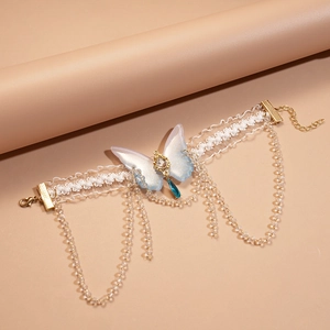 White lace choker necklace with blue gradient butterfly and hanging bead tassels