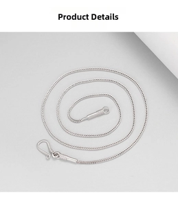 Detailed macro view of the silver braided foxtail chain necklace with S-hook clasp