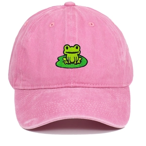 Detailed view of pink washed cotton baseball cap with green frog on lotus leaf embroidery