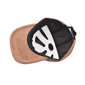 Detail of caramel corduroy baseball cap with inner sweatband and adjustable back strap