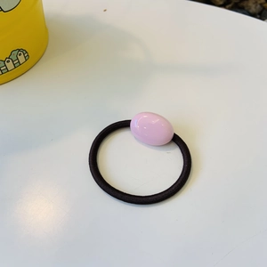 Cute pink oval resin hair tie with high elastic black band for girls stylish hair styling