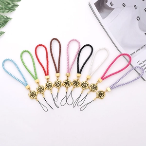 Elegant Synthetic Leather Braided Phone Lanyard With Camellia Flower Pendant Anti-Lost Wrist Strap Women Phone Accessory
