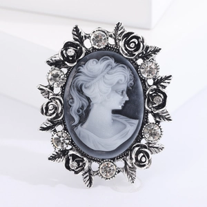Vintage relief cameo brooch with silver flower frame and crystal accents for women