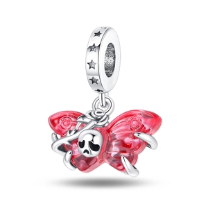 Detailed silver butterfly charm with red resin wings and a skull centerpiece detail