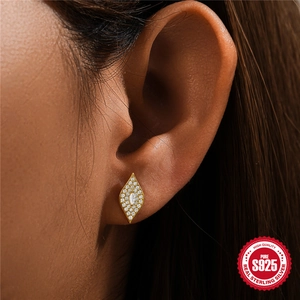 S925 sterling silver geometric leaf stud earrings with white zircons on model ear