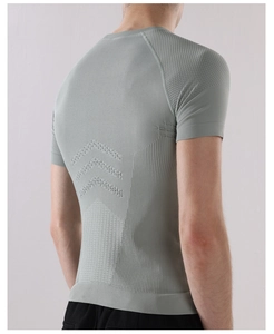 Close-up of men's breathable compression shirt featuring seamless ergonomic back patterns