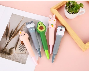 Close-up of cute cartoon squishy pens featuring slow-rebound rabbit and hamster designs