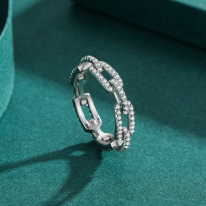 S925 sterling silver chain link ring with micro-pave white zircons on dark background