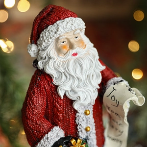 Resin Santa Claus figurine with detailed knit texture and joy scroll for Christmas decor