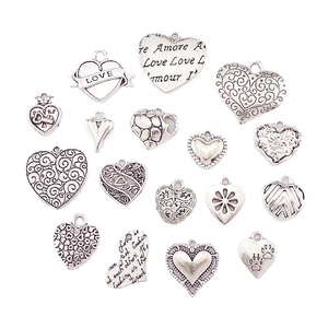 Collection of 17 vintage silver alloy heart pendants with engraved love quotes for jewelry making