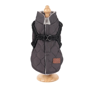 Close-up of quilted grey dog vest featuring integrated harness and warm fleece lining