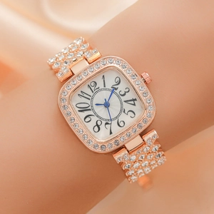 Montre carrée dorée pour femme avec aiguilles bleues et strass scintillants