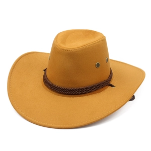 Close-up of faux suede cowboy hat showing mustard yellow texture and woven hatband