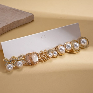 12-piece set of elegant gold-plated stud earrings with faux pearls and rhinestones