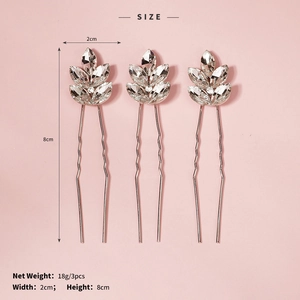 Detailed size specifications of three silver rhinestone hair pins with marquise cut crystals