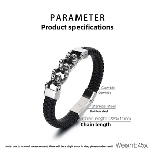 Detail view of woven cowhide leather and stainless steel skull bracelet with magnetic clasp