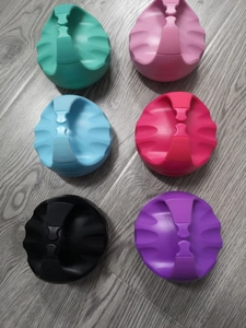Silicone scalp massage brush set in six different colors on grey wood background
