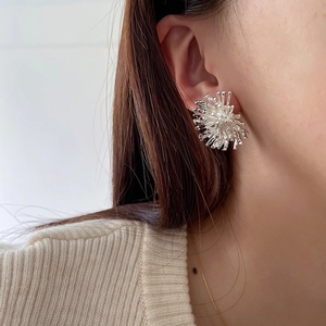 Elegant S925 silver irregular firework-shaped stud earrings in abstract metallic design