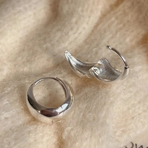 Polished 925 sterling silver hoop earrings shown in closed and open buckle positions