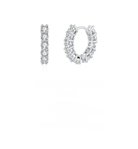 Macro shot of silver hoop earrings with double row sparkling moissanite stones
