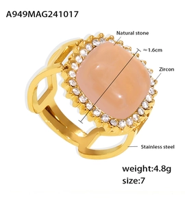 Detailed view of 316 stainless steel ring with 1.6cm orange stone and zircon halo