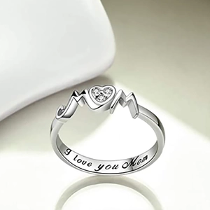 Macro shot of silver MOM ring with heart crystal and I love you Mom engraving