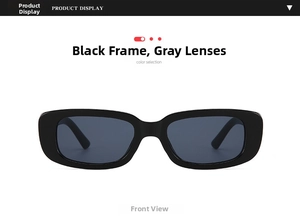 Detail view of retro rectangular sunglasses with black frames and dark gray lenses
