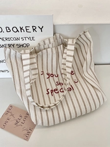 Striped canvas tote bag with smiley face and you are so special red embroidery