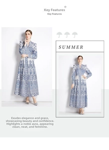 Detail of bohemian V-neck maxi dress featuring blue floral print and lantern sleeves