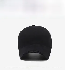 Detailed close-up of vintage distressed black baseball cap with FBKS white embroidery