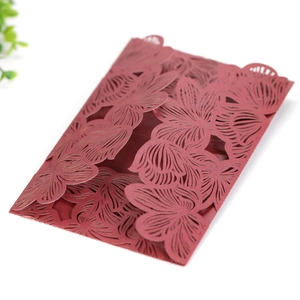 Detailed laser-cut burgundy floral invitation cover for weddings and luxury events