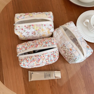 Quilted cotton floral makeup bags set of three in assorted fresh patterns and zip closure