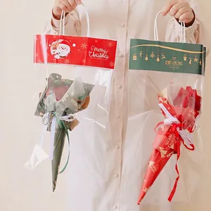 Christmas transparent handheld gift bags with festive red and green reindeer patterns