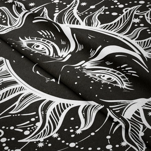 Detailed close-up showing soft polyester fabric with celestial sun and star print