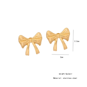 Detailed view of golden stainless steel bow earrings with 2.2x2cm size specifications