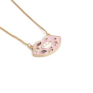 Pink enamel lip pendant necklace with colorful gemstones on a gold box chain