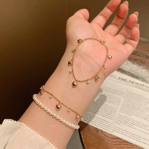 Set di bracciali di lusso vintage italiano con ciondolo a cuore e perle bianche