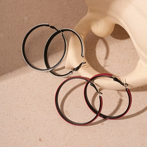Vintage geometric faux leather hoop earrings in red and silver textured finish