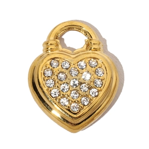 Close-up of a gold heart-shaped pendant with sparkly white crystals and a ring clasp